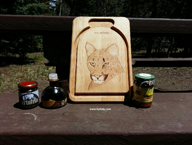 Trading Italian food for a mountain Lion on a wooden board