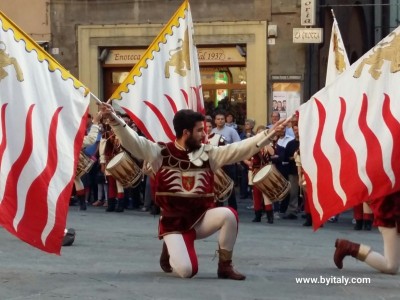 Flag waver Cortona Italy Tuscany