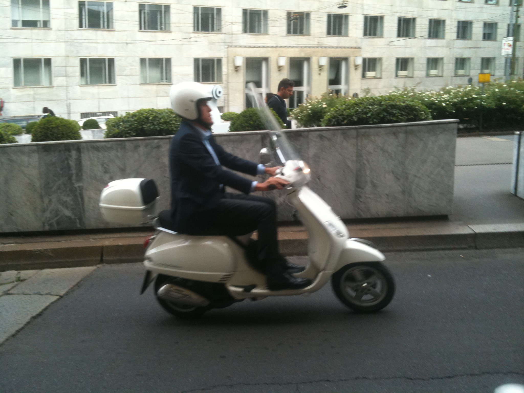 Man driving a Vespa Scooter in Milan